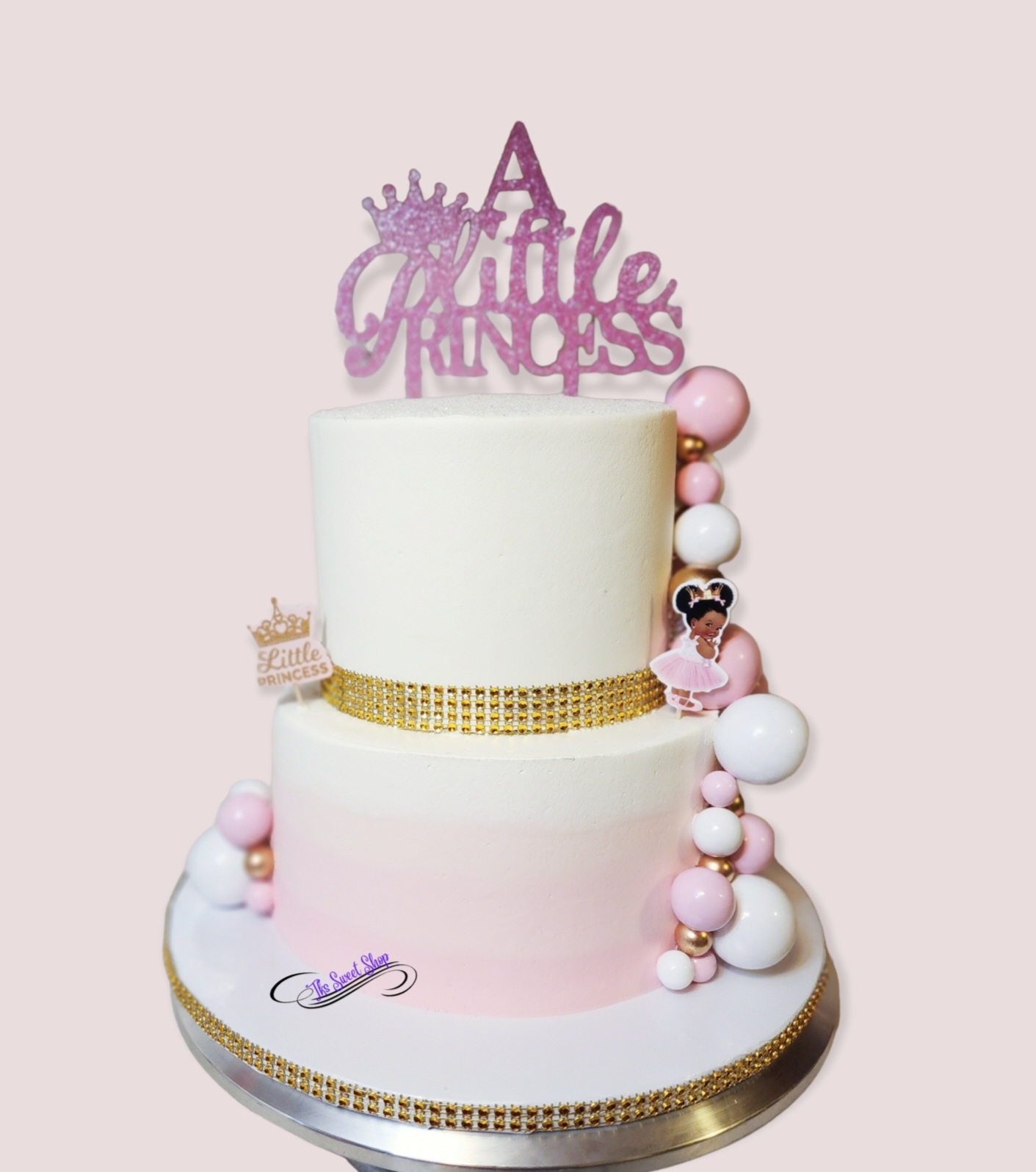 2 Tier white, pink, gold cake with cake toppers